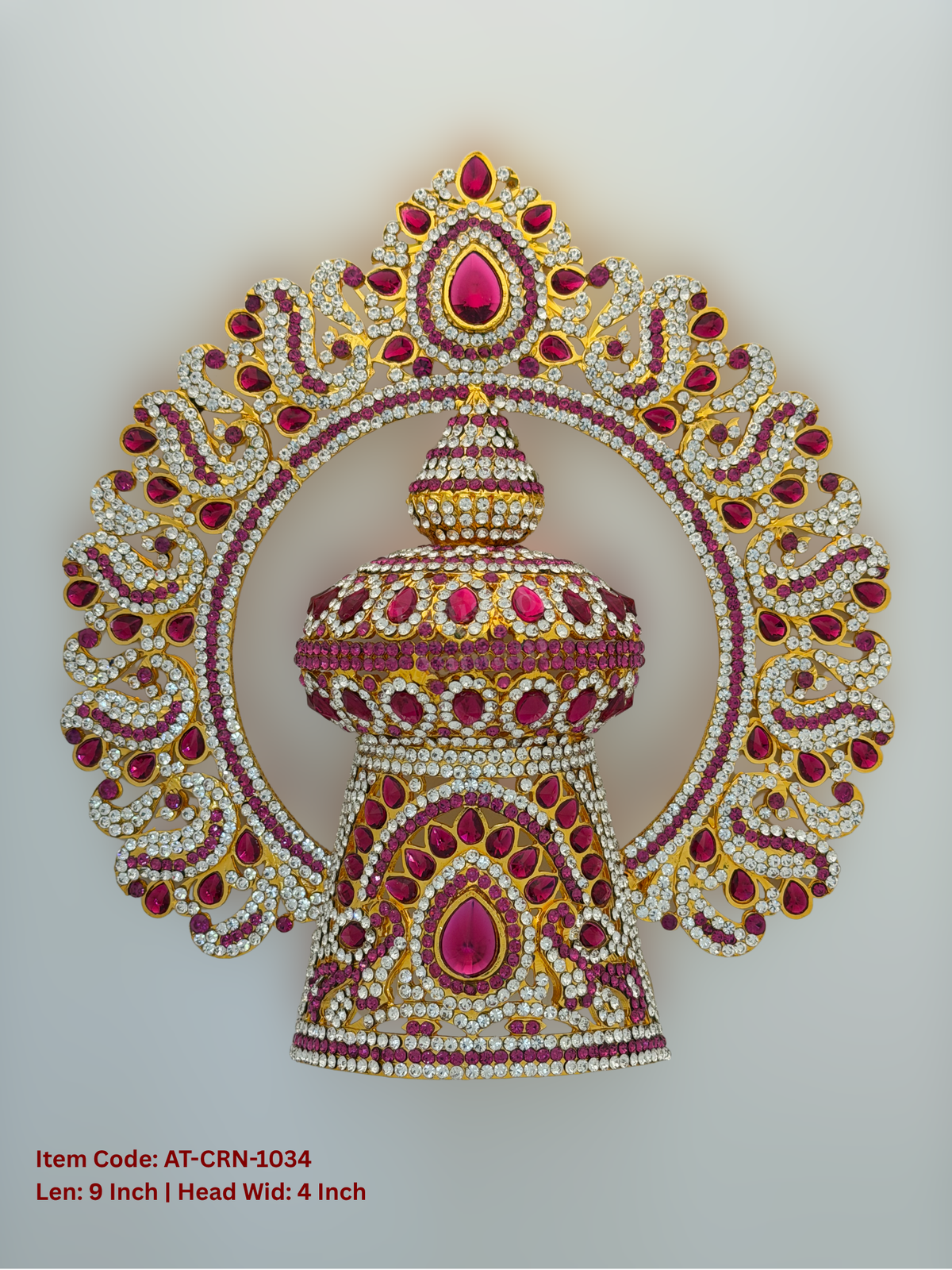Elevate your deity alankaram with our traditional gold-plated 9-inch Crown with Fuchsia Pink, White Coloured Stones.