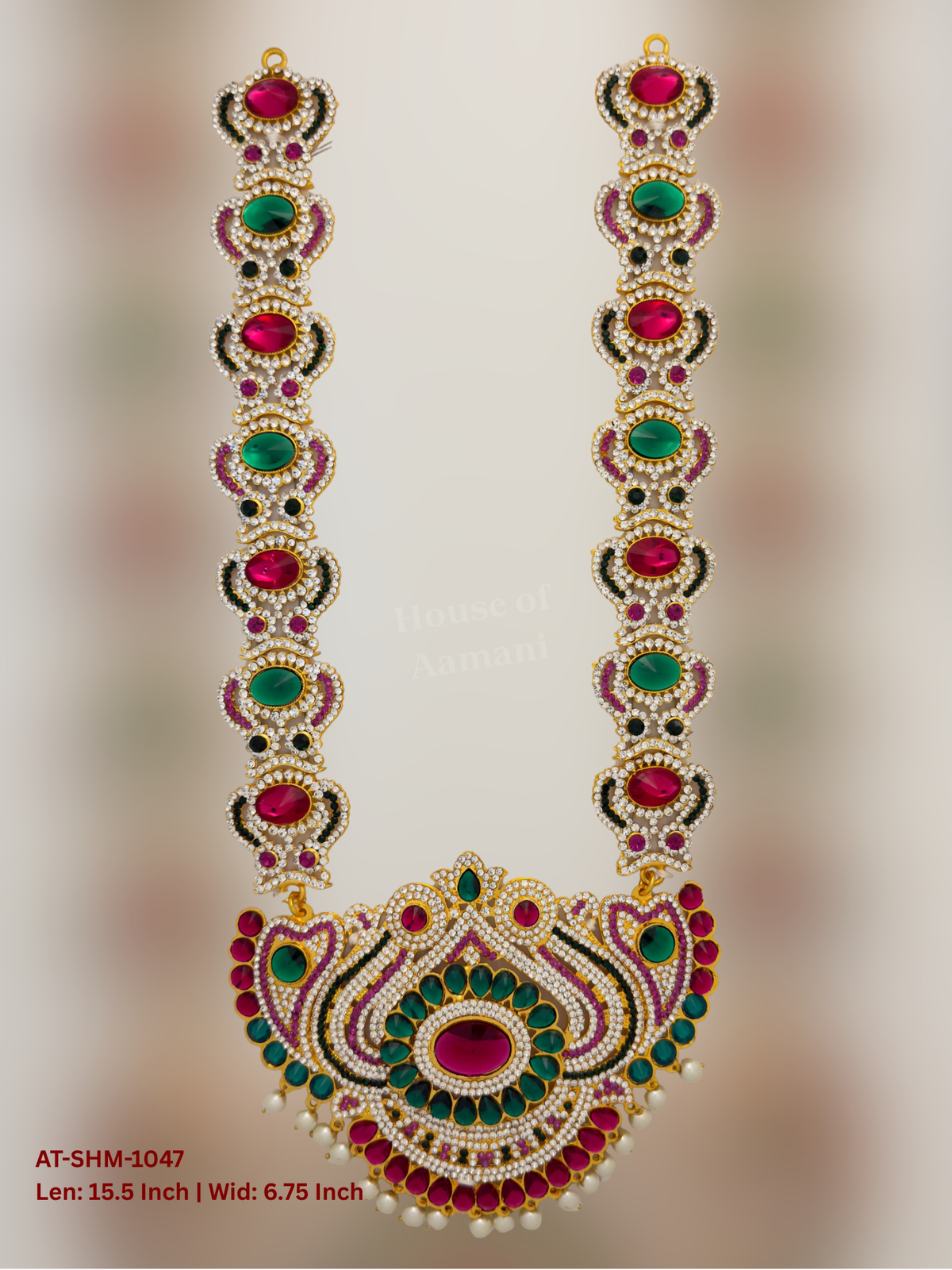 Elevate your deity alankaram with our traditional gold-plated 15.5-inch Swamy Haram with Fuchsia Pink, Green, White Coloured Stones.