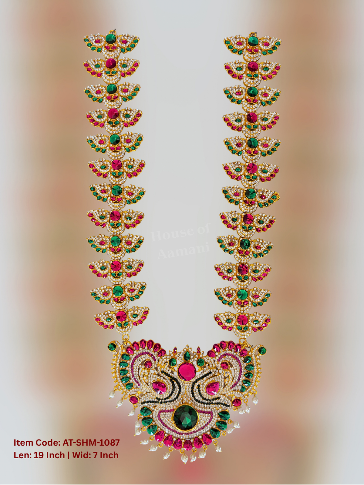 Elevate your deity alankaram with our traditional gold-plated 27-inch Swamy Haram with Fuchsia Pink, Green, White Coloured Stones.