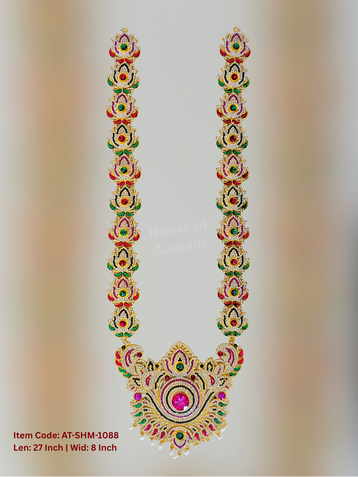 Elevate your deity alankaram with our traditional gold-plated 27.5-inch Swamy Haram with Fuchsia Pink, Green, White Coloured Stones.