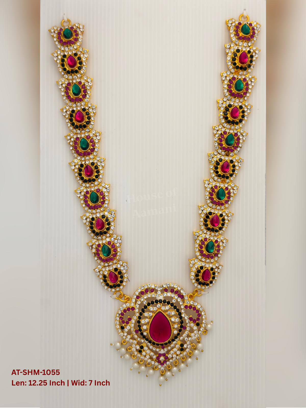 Elevate your deity alankaram with our traditional gold-plated 12.25-inch Swamy Haram with Fuchsia Pink, Green, White Coloured Stones.