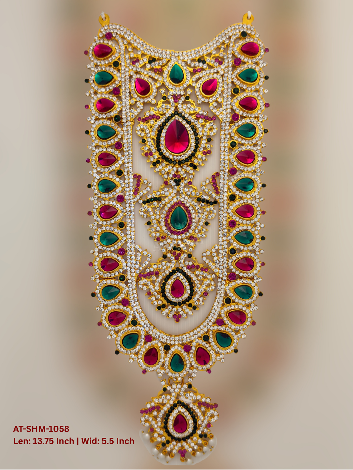 Elevate your deity alankaram with our traditional gold-plated 13.75-inch Swamy Haram with Fuchsia Pink, Green, White Coloured Stones.