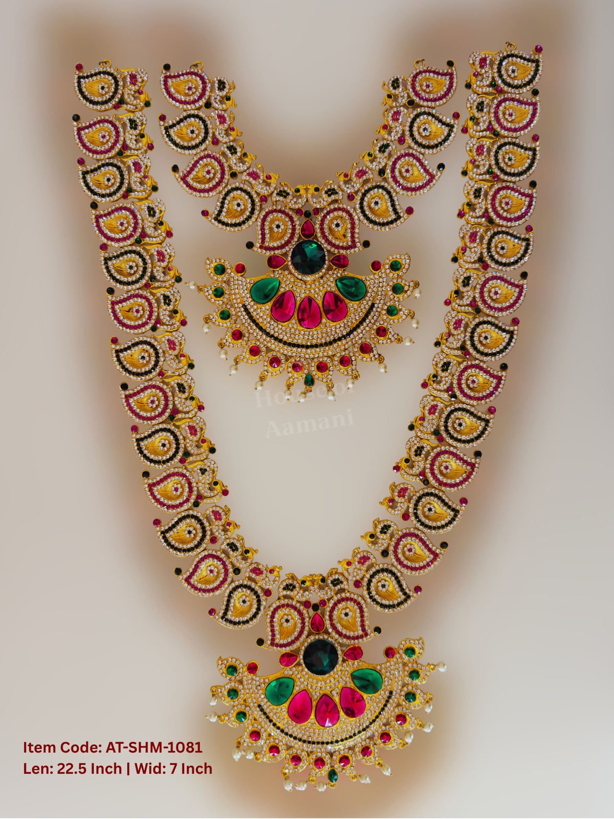 Elevate your deity alankaram with our traditional gold-plated 23.5-inch Swamy Haram with Fuchsia Pink, Green, White Coloured Stones.