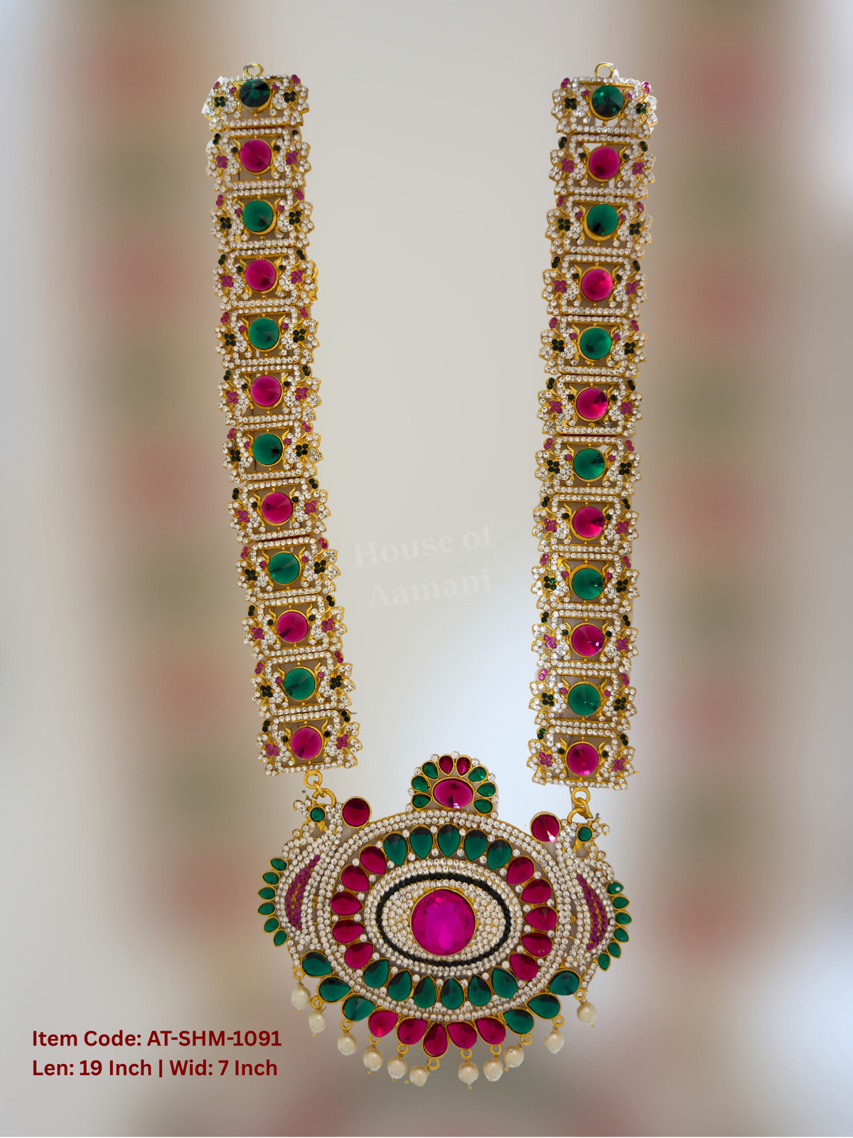 Elevate your deity alankaram with our traditional gold-plated 19-inch Swamy Haram with Fuchsia Pink, Green, White Coloured Stones.