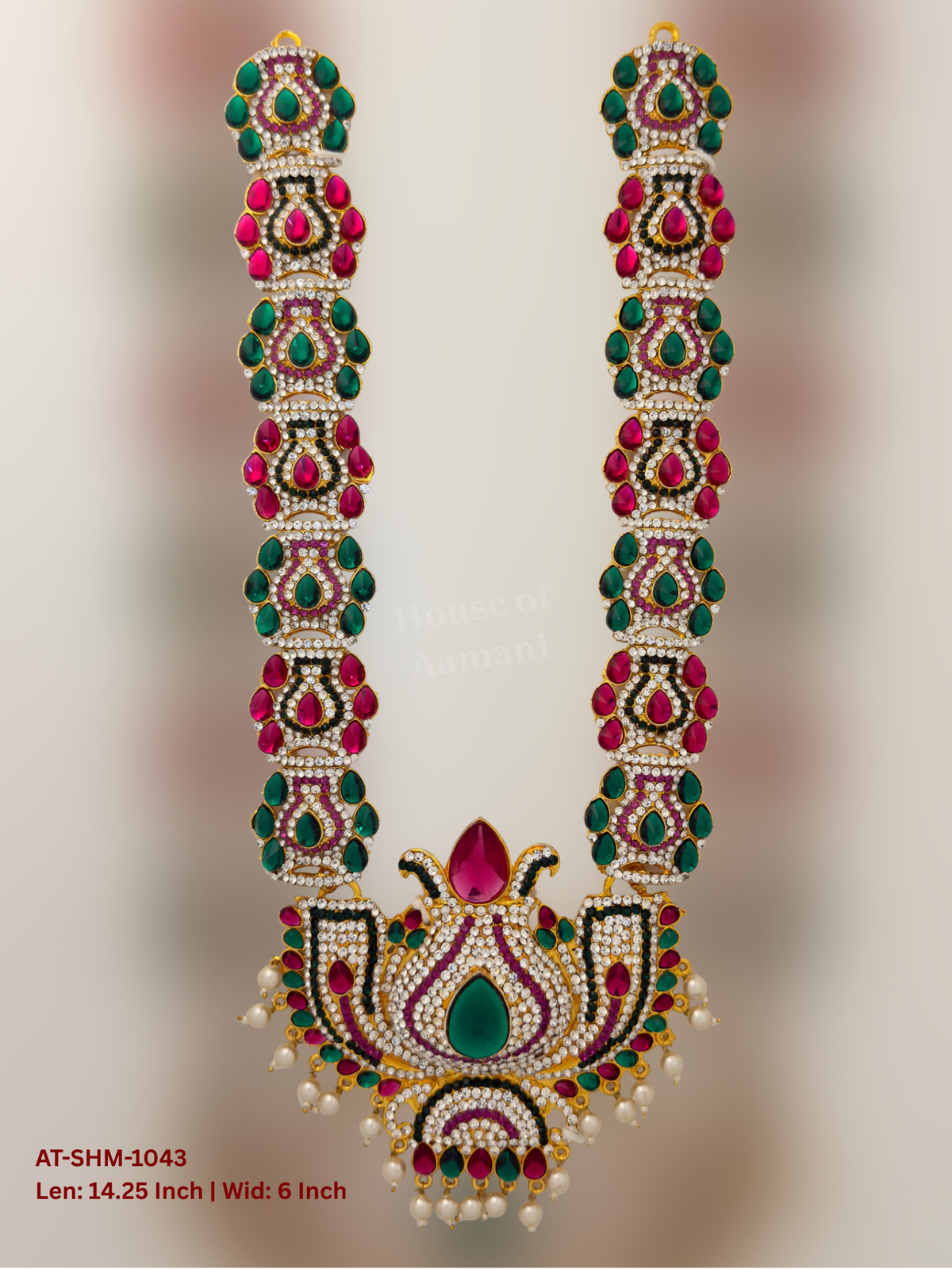 Elevate your deity alankaram with our traditional gold-plated 14.25-inch Swamy Haram with Fuchsia Pink, Green, White Coloured Stones.