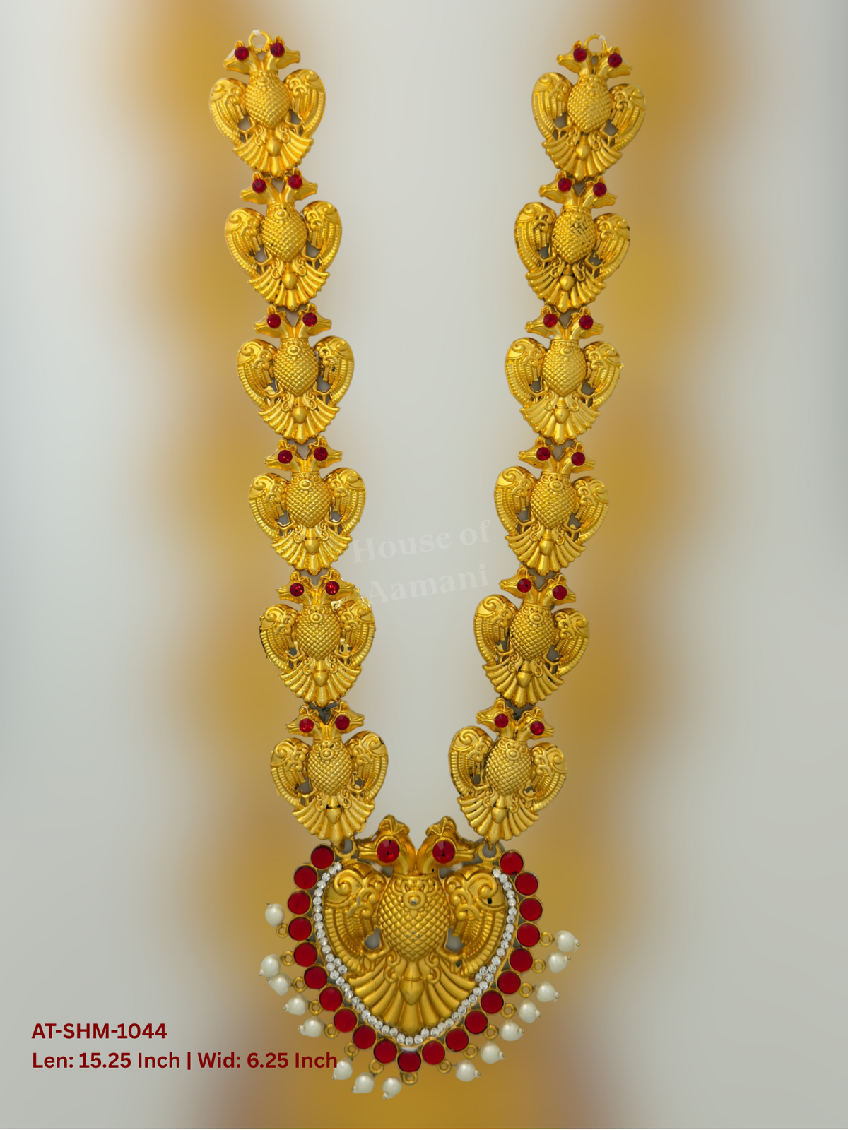 Elevate your deity alankaram with our traditional gold-plated 15.25-inch Swamy Haram with Ruby Red, White Coloured Stones.