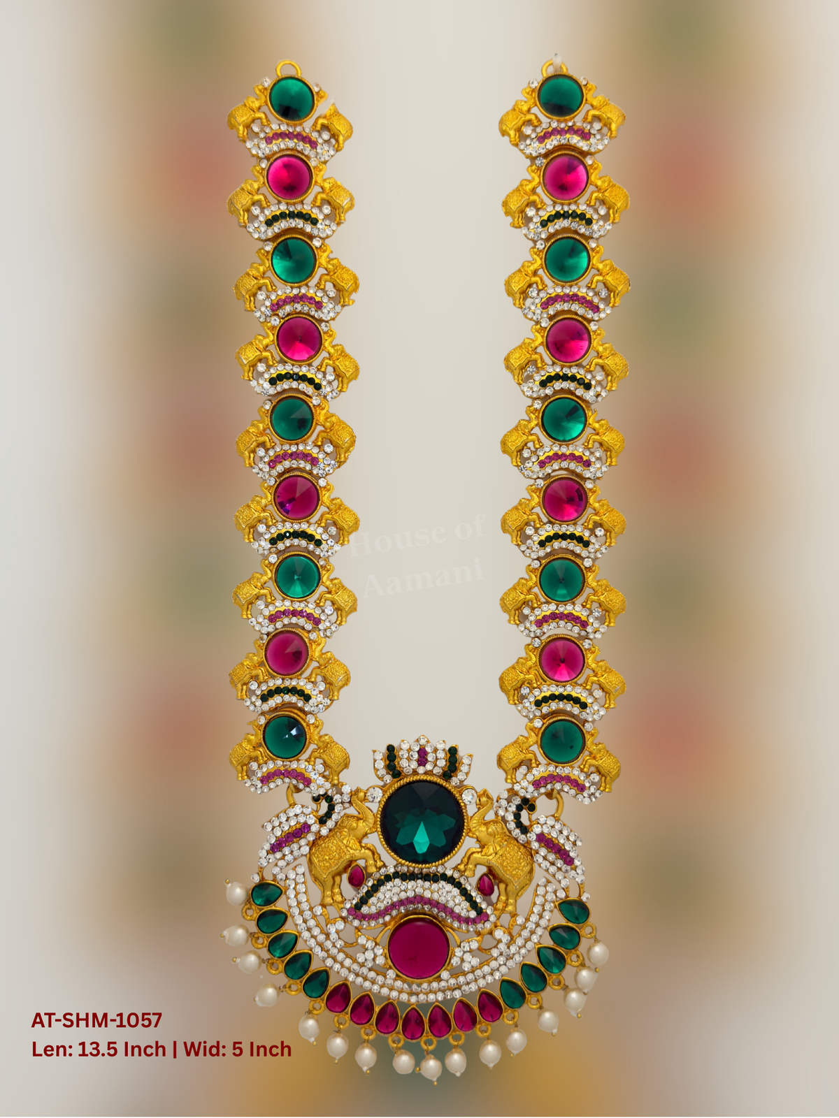 Elevate your deity alankaram with our traditional gold-plated 13.5-inch Swamy Haram with Fuchsia Pink, Green, White Coloured Stones.