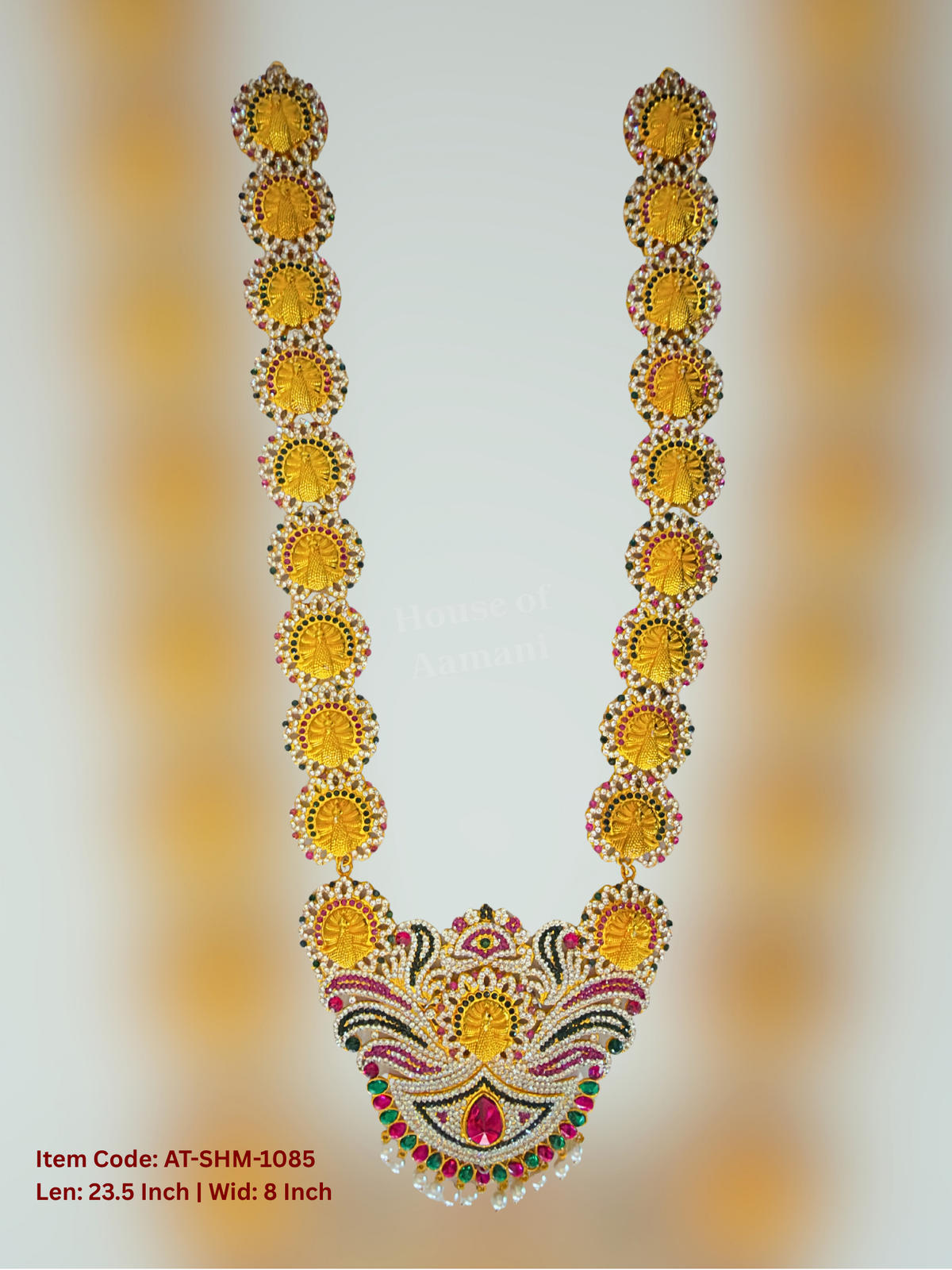 Elevate your deity alankaram with our traditional gold-plated 19-inch Swamy Haram with Fuchsia Pink, Green, White Coloured Stones.