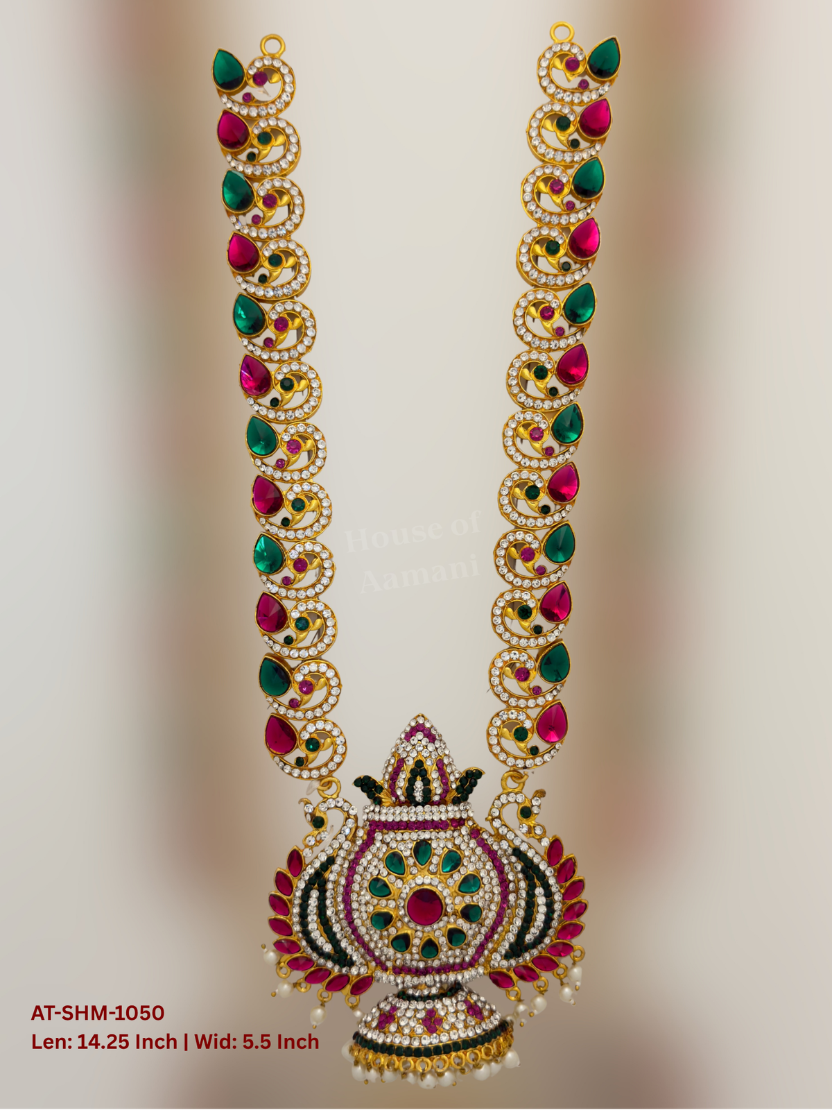 Elevate your deity alankaram with our traditional gold-plated 14.25-inch Swamy Haram with Fuchsia Pink, Green, White Coloured Stones.