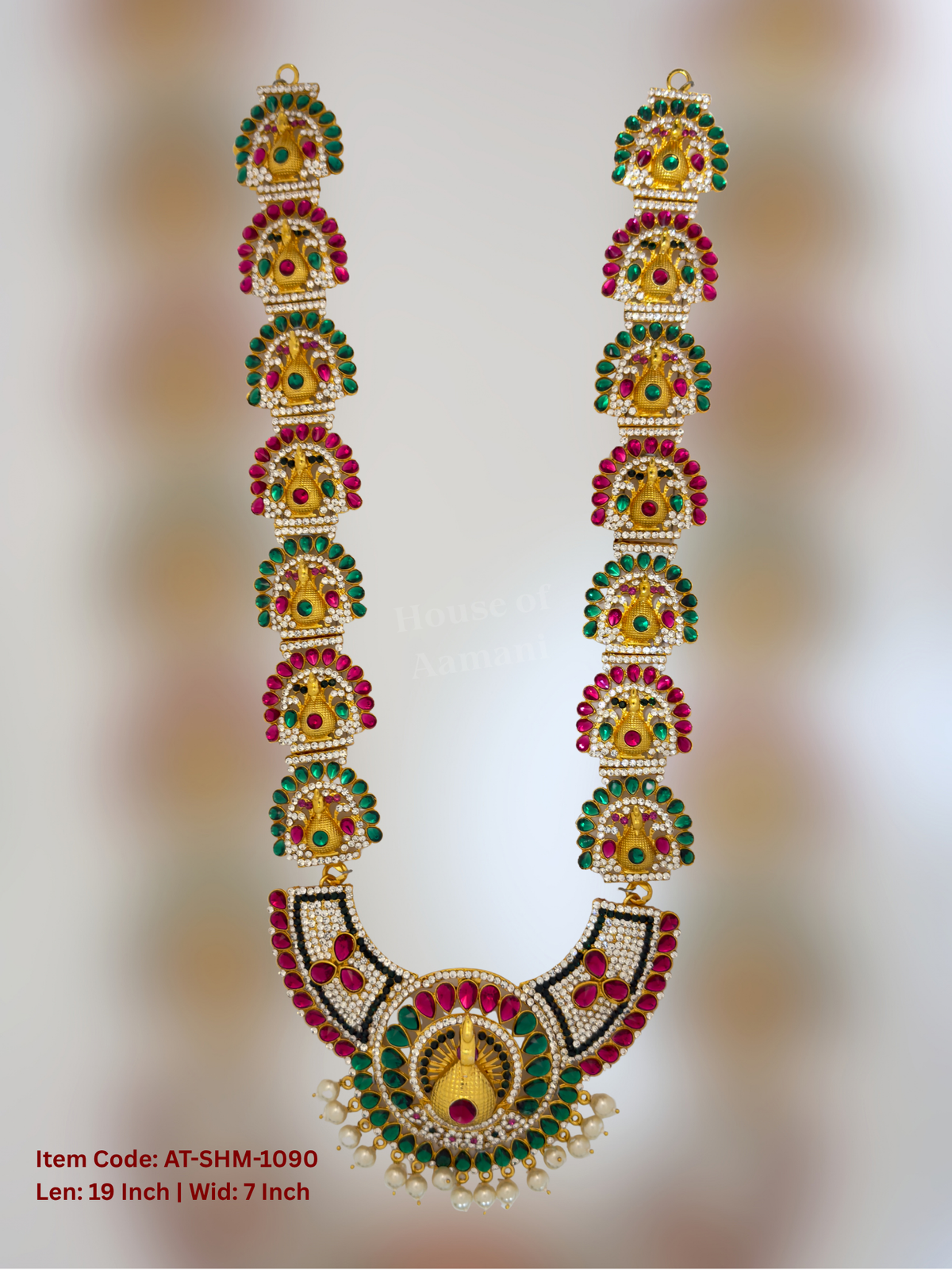 Elevate your deity alankaram with our traditional gold-plated 19-inch Swamy Haram with Fuchsia Pink, Green, White Coloured Stones.